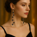 Crystal Bloom – Long 925 silver tassel earrings with sparkling crystal flowers