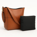 Elara womens genuine leather bucket tote in Black, Earth Yellow, Olive Green, and White with magnetic buckle and inner pocket (330×330×120 mm).
