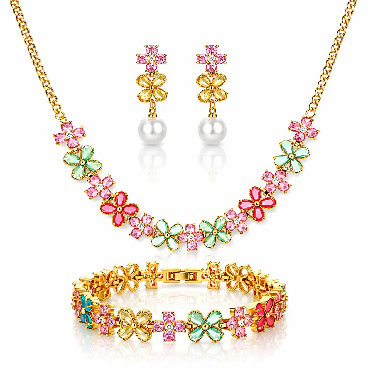 Gold-tone jewelry set featuring a necklace, matching drop earrings, and bracelet, decorated with pink and green flower-shaped rhinestones and white pearl-like beads.