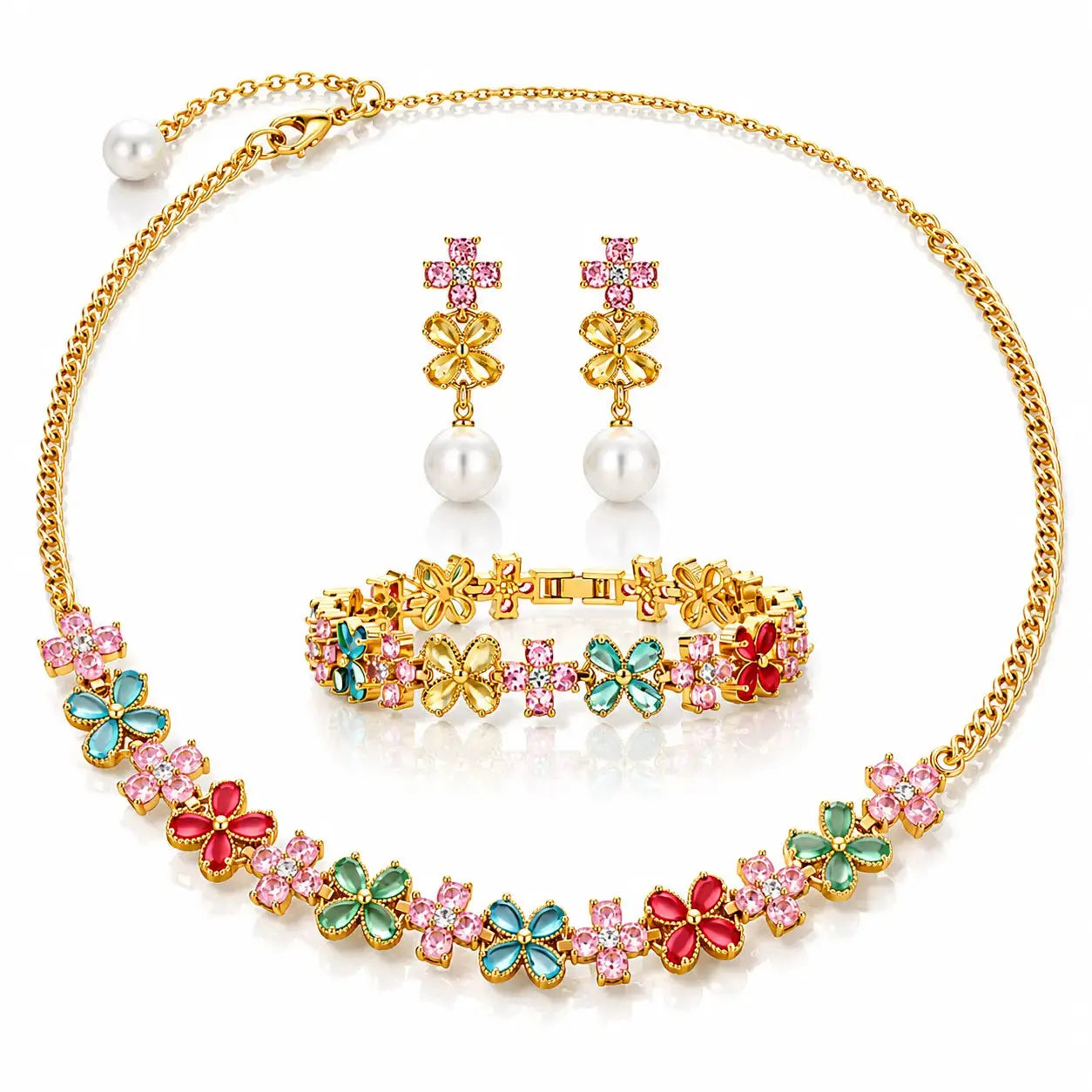 Gold-tone jewelry set featuring a necklace, bracelet, and matching earrings with floral designs set with pink, green, and red rhinestones, accented by white faux pearls.