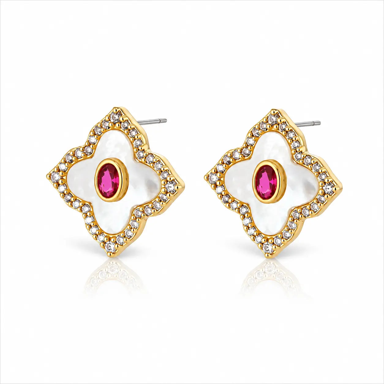 A pair of gold and white flower-shaped stud earrings with a central pink gemstone and small clear rhinestone accents, shown on a white background.