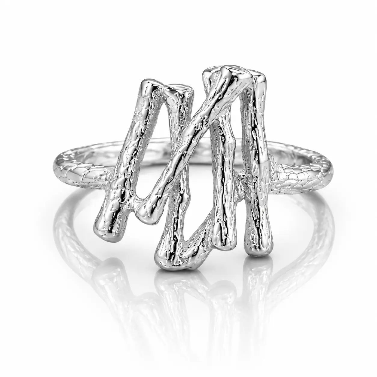 Silver ring with a unique design on a white background