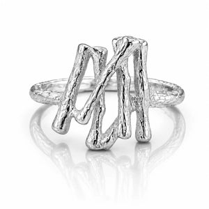 Silver ring with a unique design on a white background