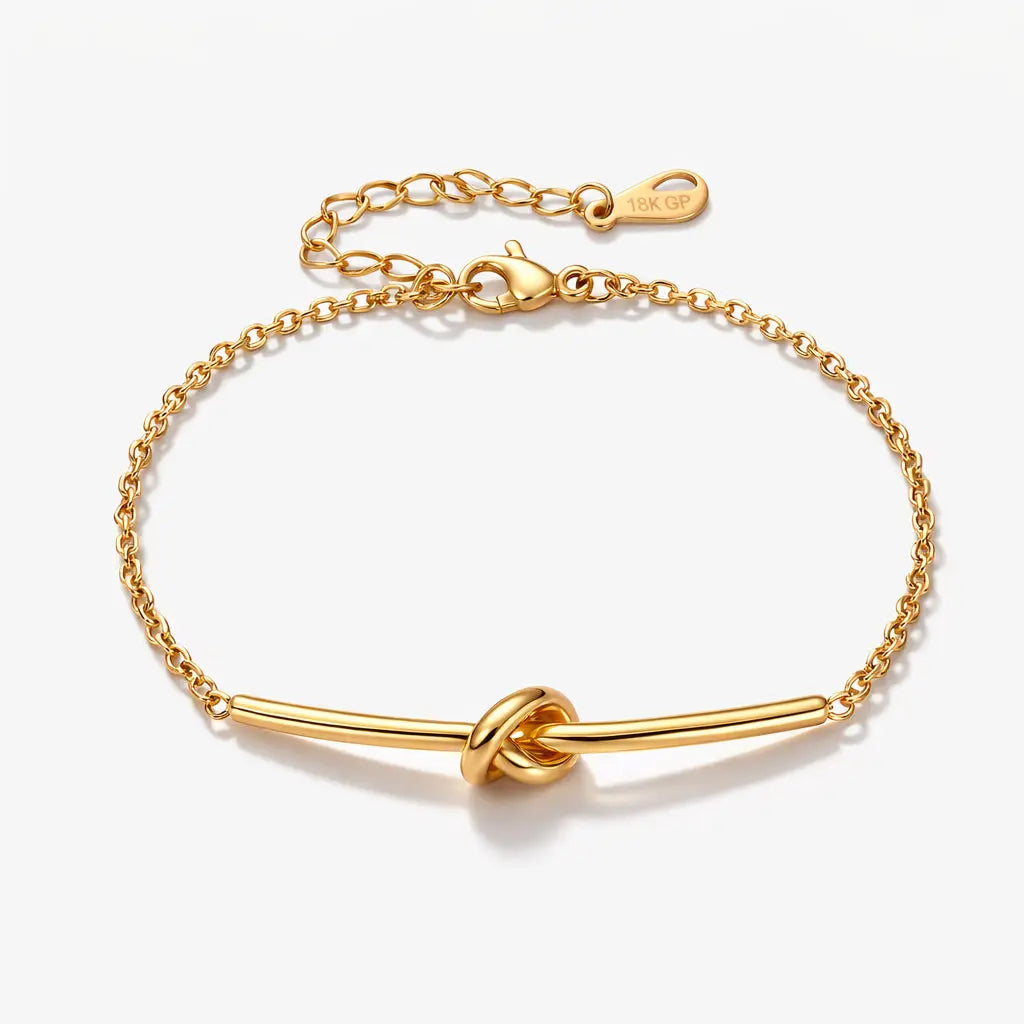18k gold plated knot bar bracelet with adjustable chain on white background