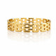 A polished yellow gold link bracelet with a multi-row interlocking chain design, shown on a clean white background with a soft reflection below.