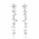 Silver floral earrings on a white background