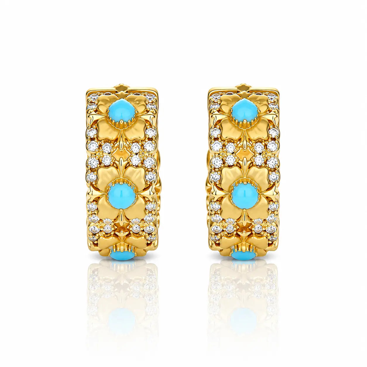 Gold hoop earrings with turquoise stones on a white background