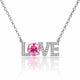 A silver-tone necklace with a pendant spelling LOVE, where the O is a round pink gemstone and the other letters are set with small clear stones, on a white background with a reflection.