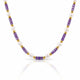 A beaded necklace featuring alternating strands of faceted purple amethyst beads, white freshwater pearls, and polished gold spacer beads, displayed on a clean white background with a soft reflection.