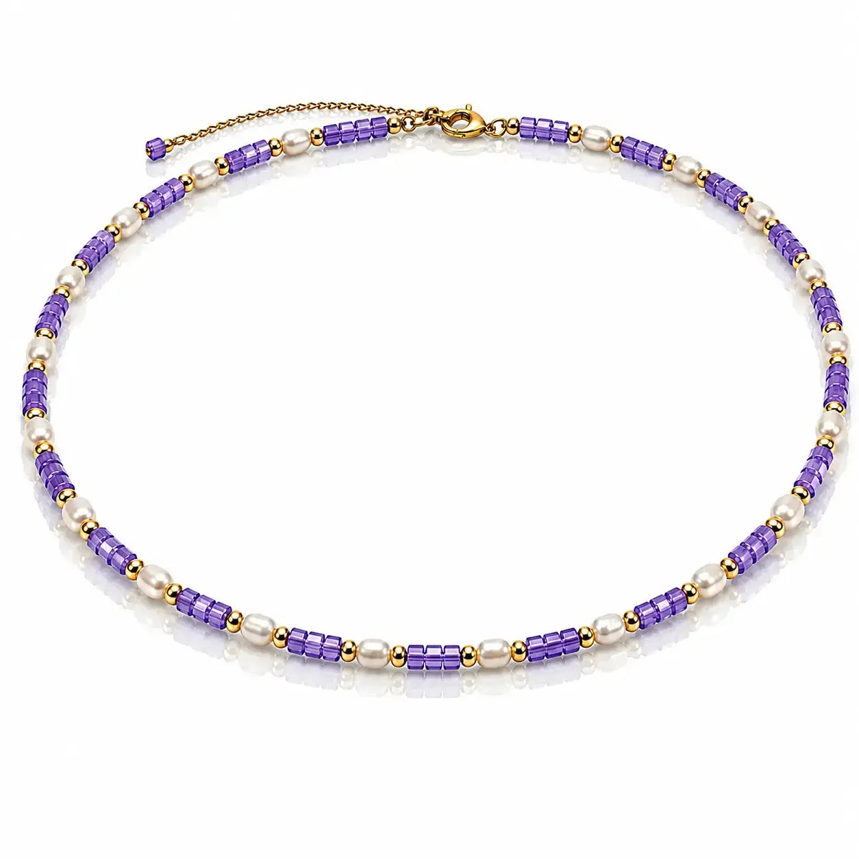 A beaded necklace featuring alternating strands of purple cylindrical beads and white pearl-like beads, separated by small gold spacer beads, with a gold clasp and extender chain on a white background.