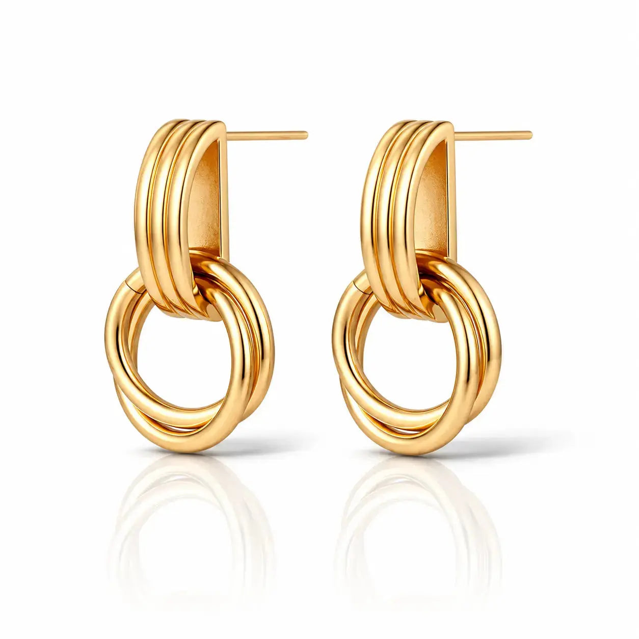 A pair of gold-toned hoop earrings with a multi-band top and interlocking circular drop, shown on a clean white background with a soft reflection below.