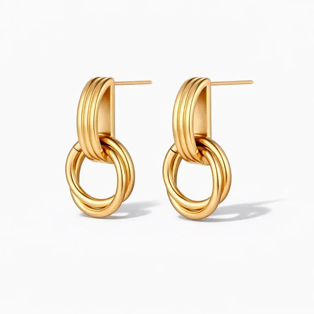 18K gold plated linear loop earrings with interlocking hoop design on white background