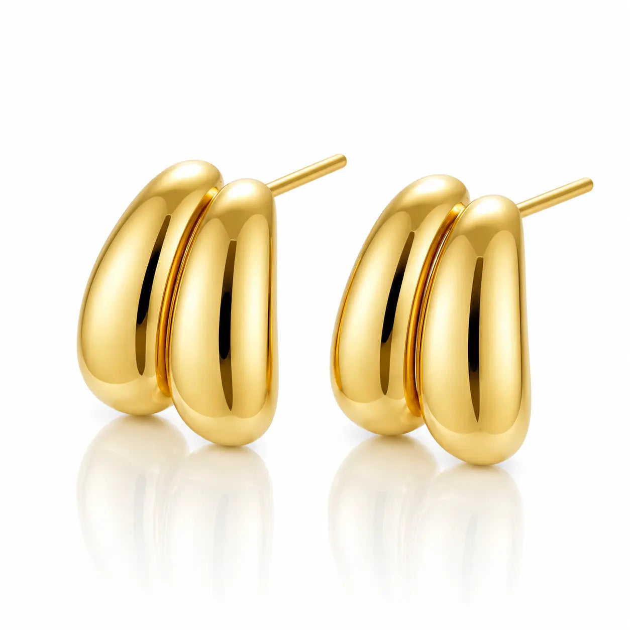 A pair of polished gold hoop earrings with a rounded, three-bar design, displayed on a clean white background with soft reflections below.
