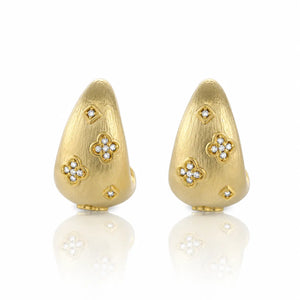 Pair of gold earrings with diamond accents on a white background