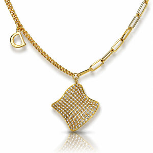 Gold necklace with a square pendant on a white background
