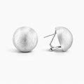 Sterling silver dome brushed earrings with textured finish on white background