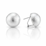 A pair of textured silver ball stud earrings, one shown from the front and the other from the side displaying the post and butterfly back, on a reflective white surface.