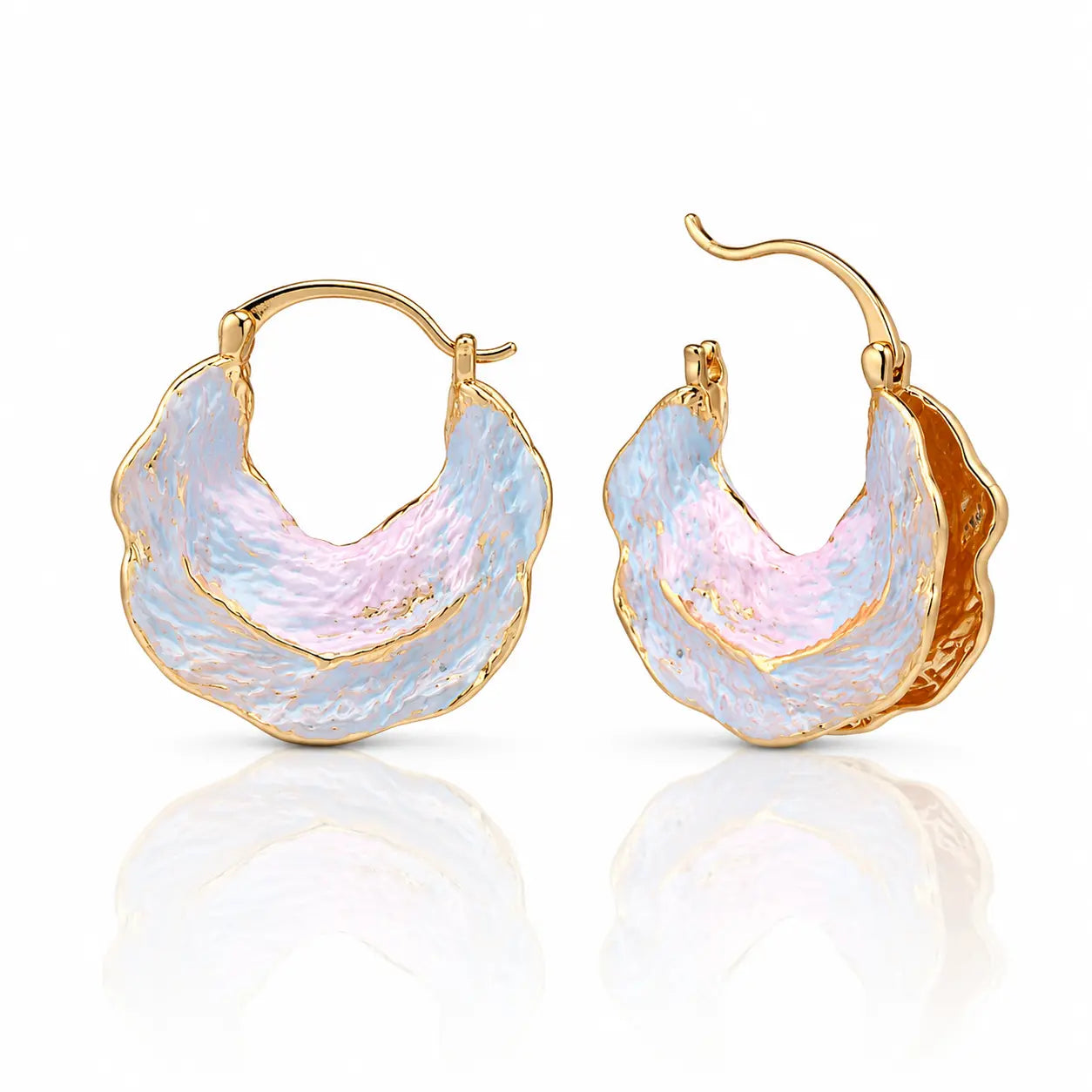 Gold hoop earrings with a textured, multicolored design on a white background