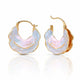 Gold hoop earrings with a textured, multicolored design on a white background