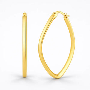 Gold hoop earrings on a white background