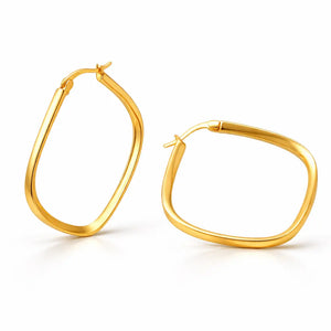 Gold hoop earrings on a white background