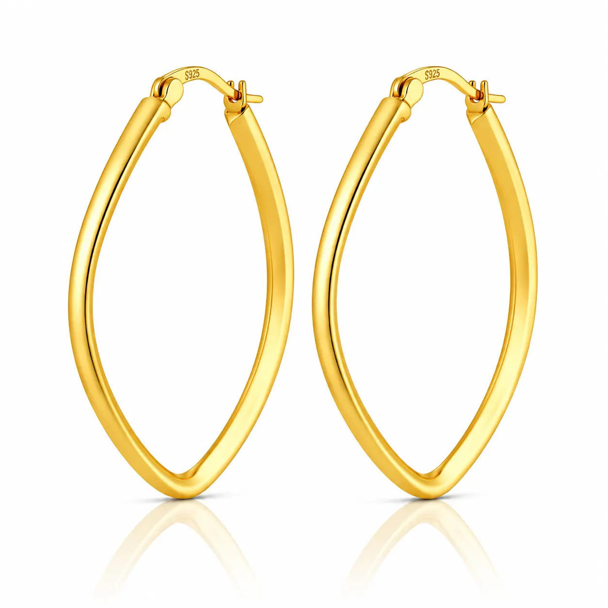 Pair of gold hoop earrings on a white background