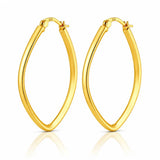 Pair of gold hoop earrings on a white background