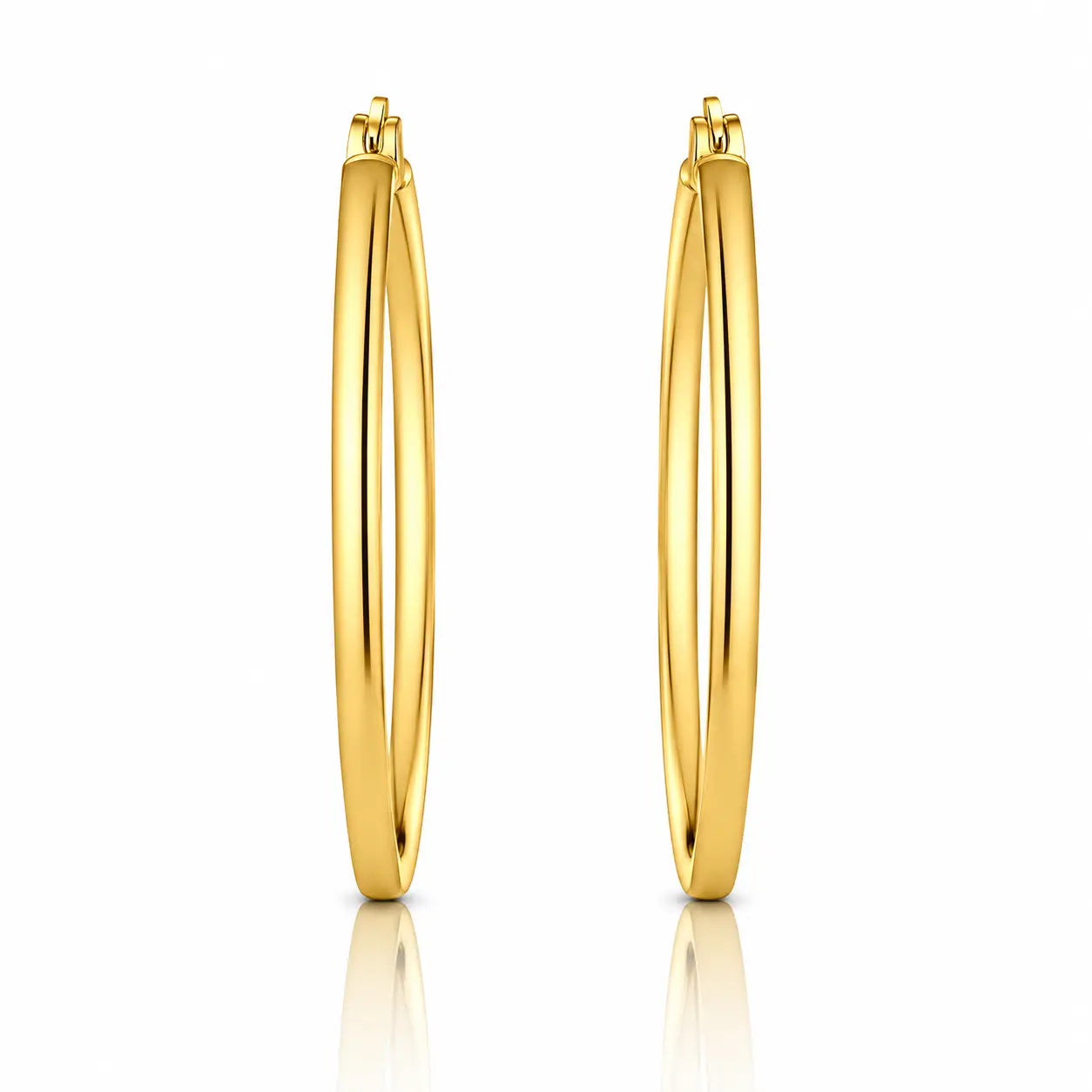Gold hoop earrings on a white background