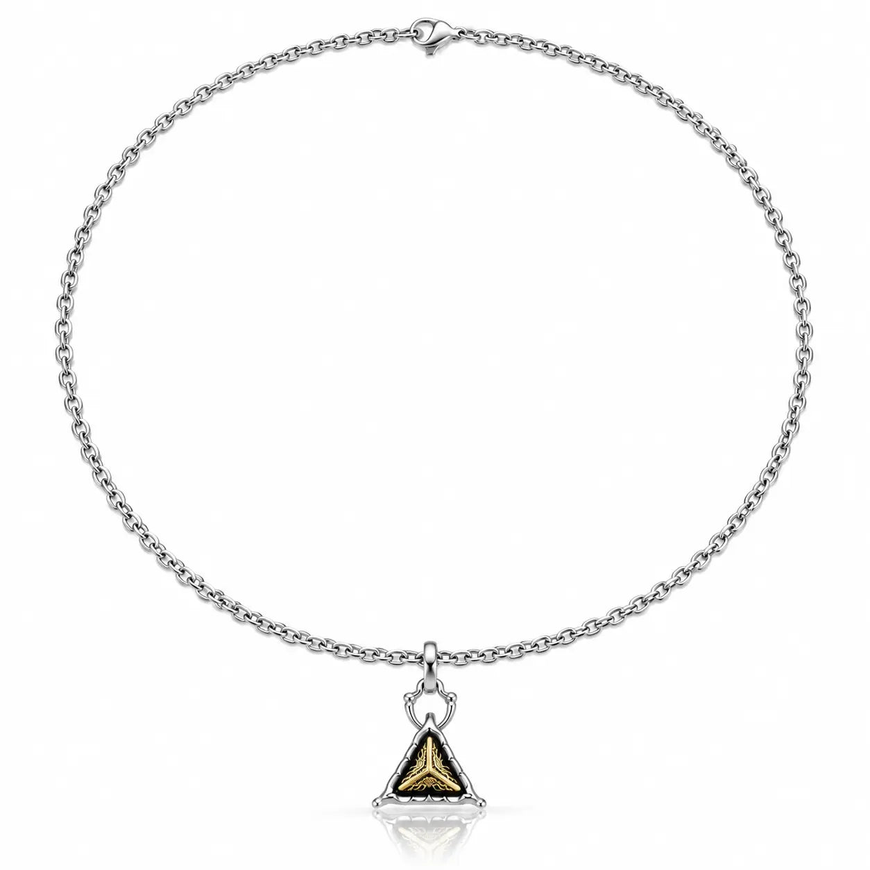 A silver chain necklace with a triangular pendant featuring a gold-toned center and black inlay, displayed on a clean white background.