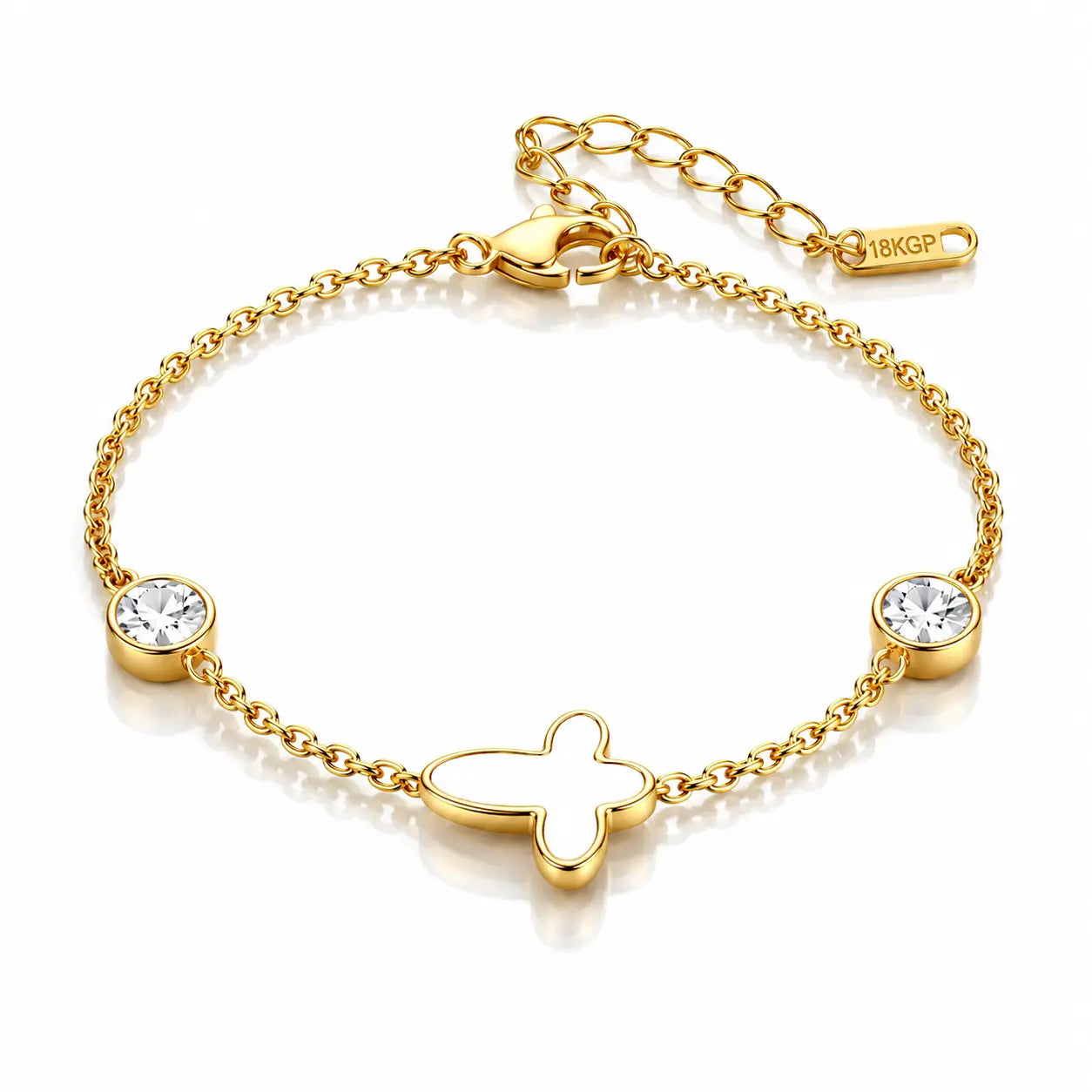 A gold chain bracelet with a central four-leaf clover charm, two bezel-set clear rhinestones, and an adjustable clasp with an extender chain. The brand name '18KGP' is engraved on the small tag near the clasp.
