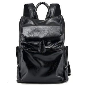 MetroCraft unisex PU leather laptop backpack in Black or Brown, minimalist design, 12×35×40 cm, lightweight 0.8 kg.
