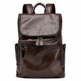 MetroCraft unisex PU leather laptop backpack in Black or Brown, minimalist design, 12×35×40 cm, lightweight 0.8 kg.
