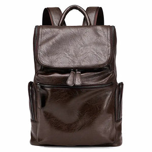 MetroCraft unisex PU leather laptop backpack in Black or Brown, minimalist design, 12×35×40 cm, lightweight 0.8 kg.
