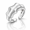 A silver open ring with a sculptural, wavy bamboo-like textured band, featuring a brushed finish on the top and polished edges. The inner band is engraved with 'S925'.