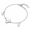 A silver chain bracelet featuring a central heart-shaped charm, two small white pearls, and a heart-shaped brand tag engraved with 'SOL' on a clean white background.