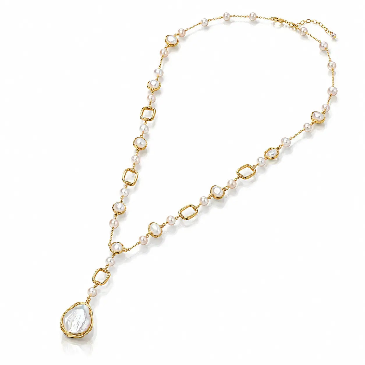 A gold and pearl necklace featuring a large, irregular-shaped pearl pendant in a gold bezel setting, displayed on a clean white background.