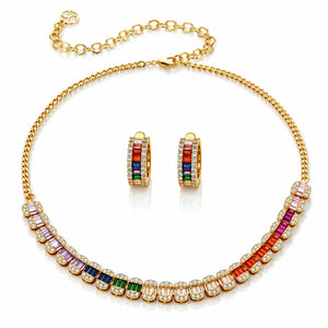 Gold jewelry set featuring a choker necklace and matching hoop earrings, both adorned with colorful baguette gemstones and clear crystals on a white background.