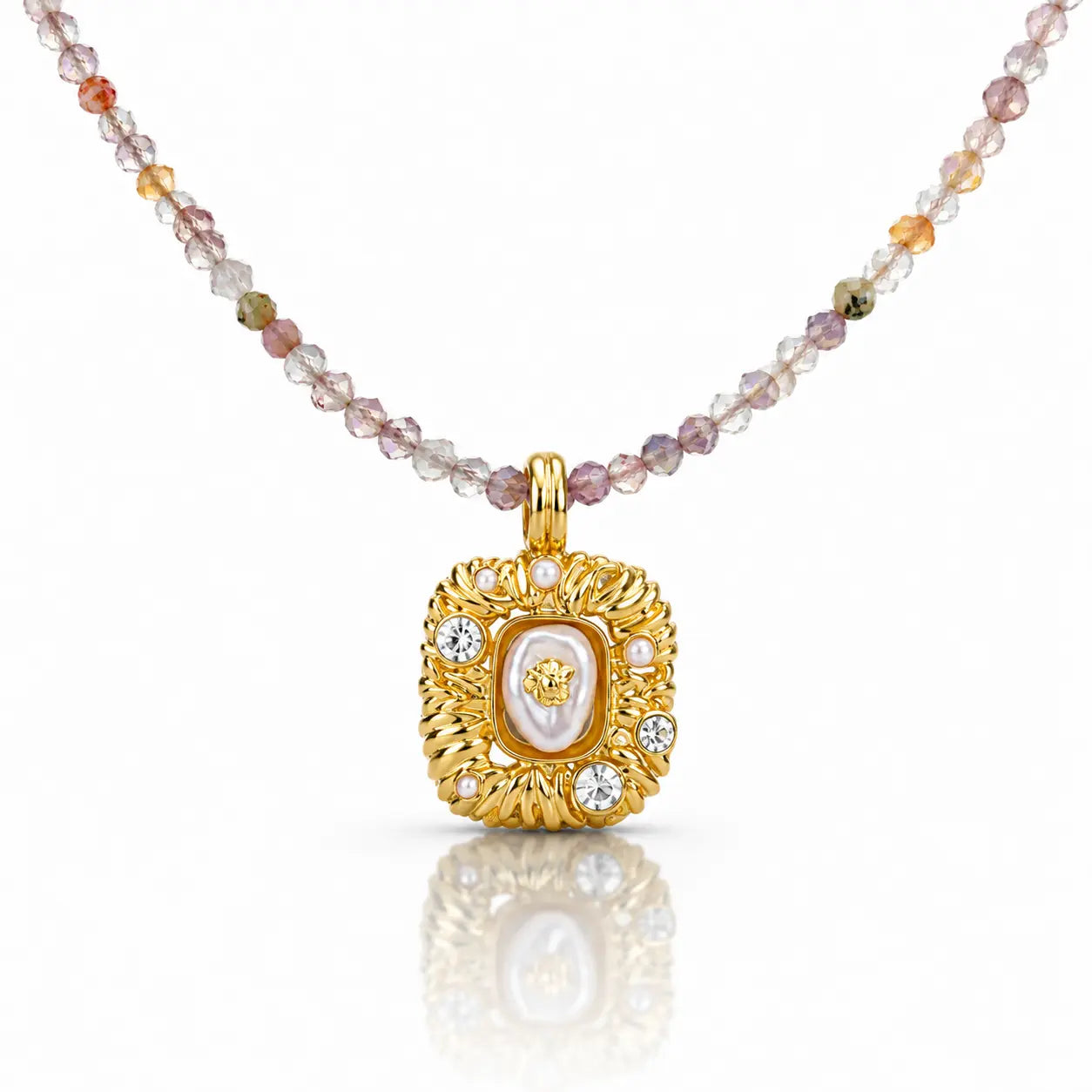 Gold pendant necklace with multicolored beads on a white background