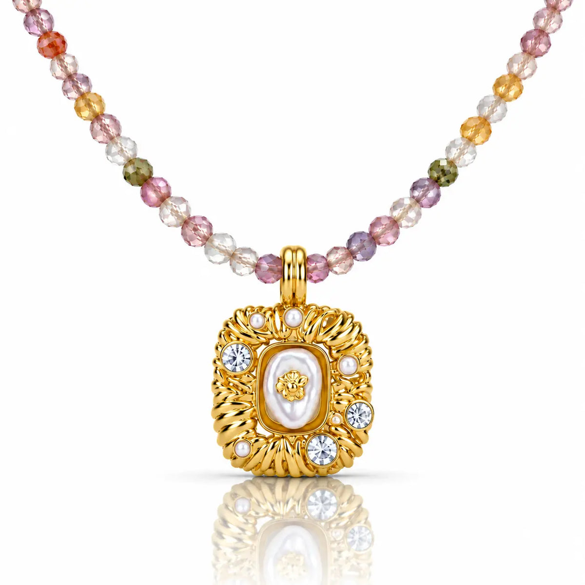 A gold pendant necklace featuring a central white pearl surrounded by small clear stones, hanging from a beaded chain with multicolored round beads on a white background.