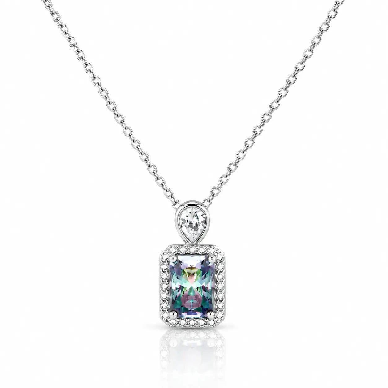 A silver-toned necklace with a rectangular iridescent gemstone pendant surrounded by a halo of small clear stones, suspended from a delicate silver chain on a white background.