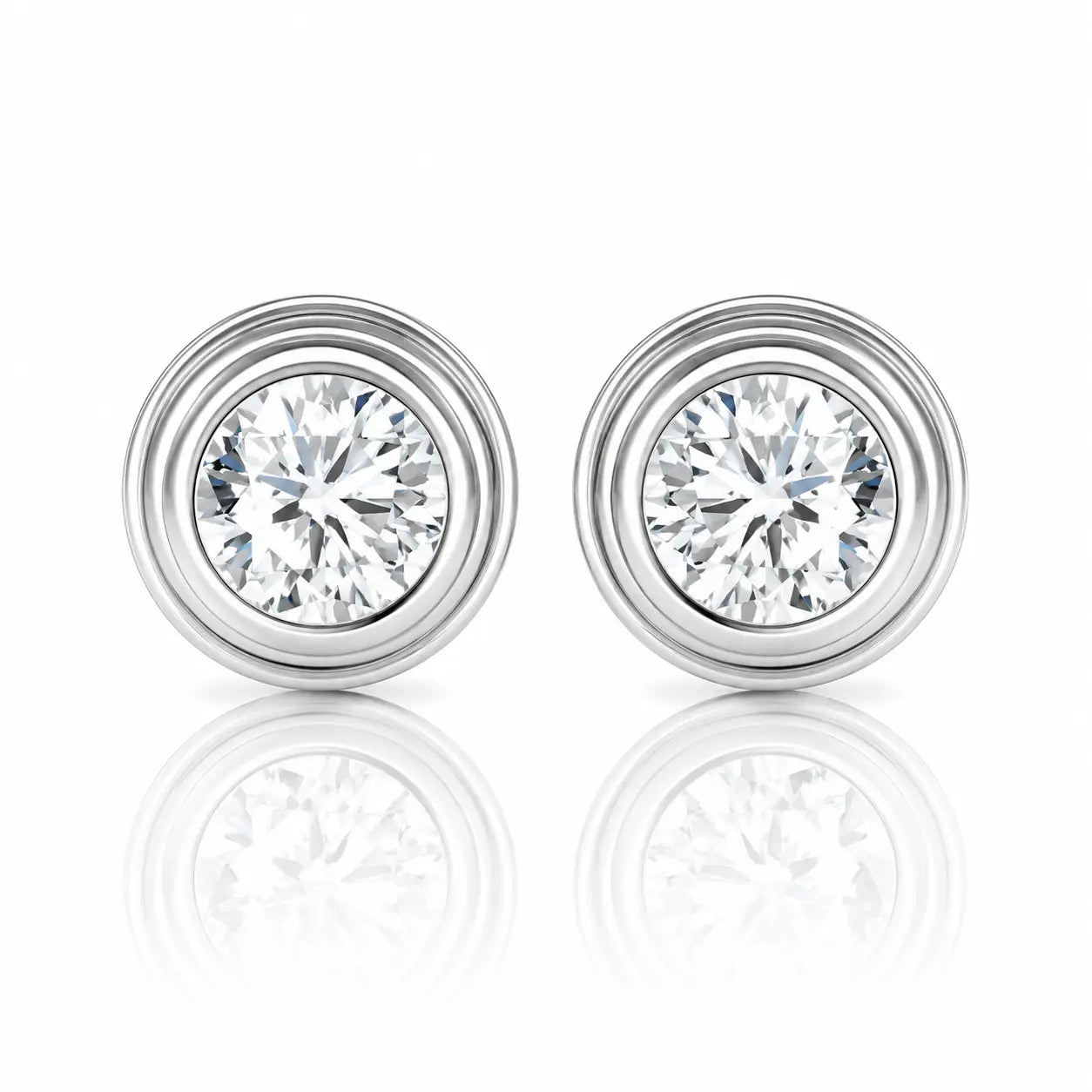 Pair of diamond stud earrings on a white background