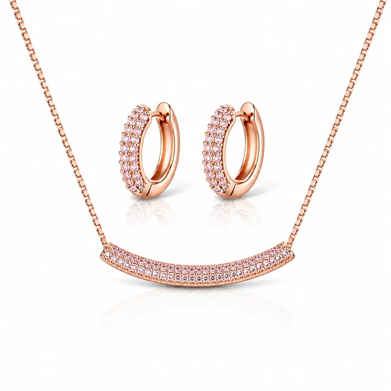 Rose gold jewelry set featuring a curved bar necklace and matching hoop earrings, both adorned with rows of small clear pavé stones, shown on a white background with soft reflections.
