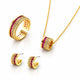 Gold jewelry set featuring a ring, necklace, and earrings, each adorned with rows of red gemstones and small clear stones, displayed on a white background.