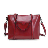 Seraphine – Retro chic one-strap PU oil wax leather messenger bag in coffee, black, red, and brown