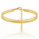 A double-strand gold bracelet featuring a textured snake chain and a smoother tubular chain, with an extender chain and a small oval 925 sterling silver tag hanging from the clasp, set against a white background with a soft reflection.