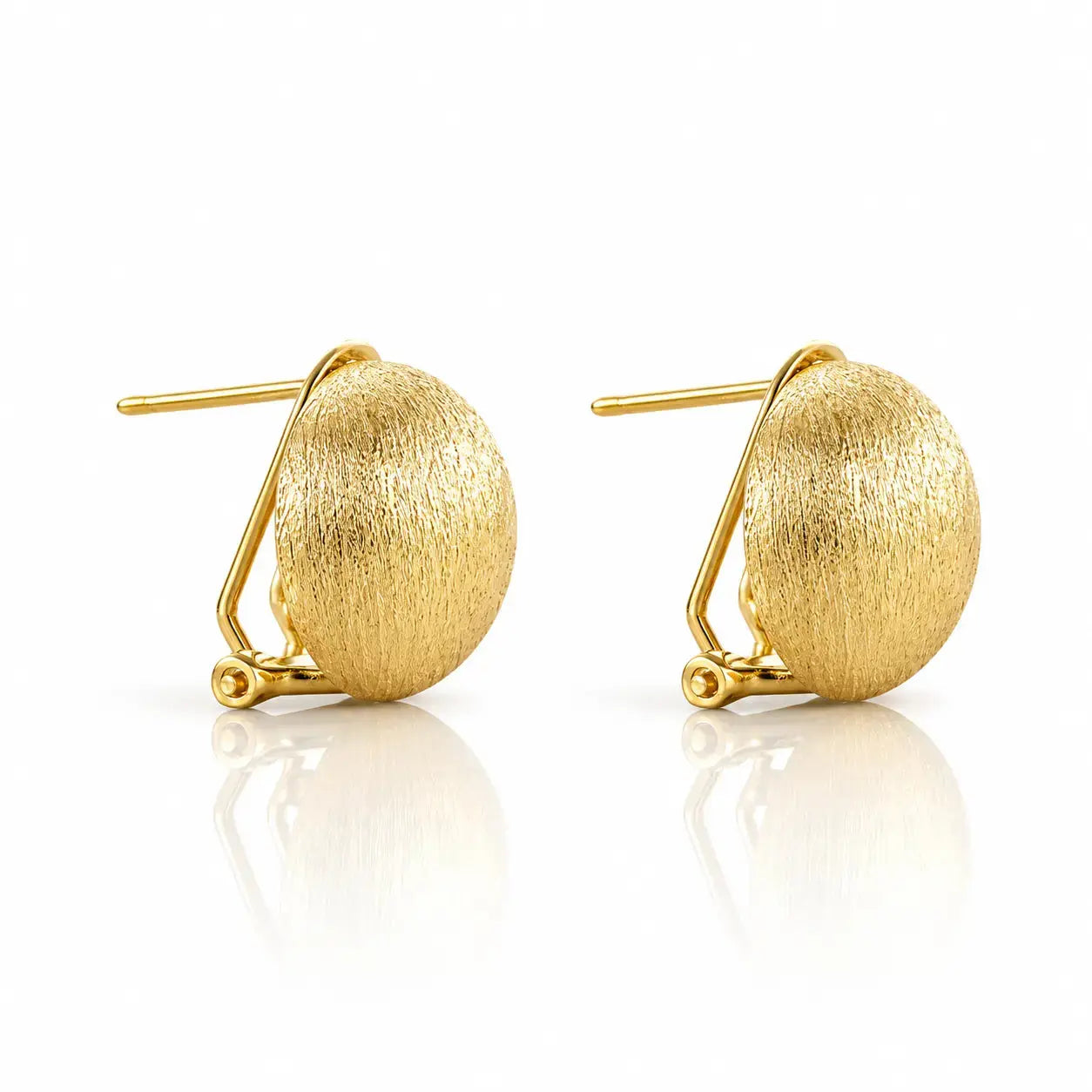 A pair of gold post earrings with textured, rounded disc-shaped fronts and thin wire hooks, displayed on a clean white background with a soft reflection below.