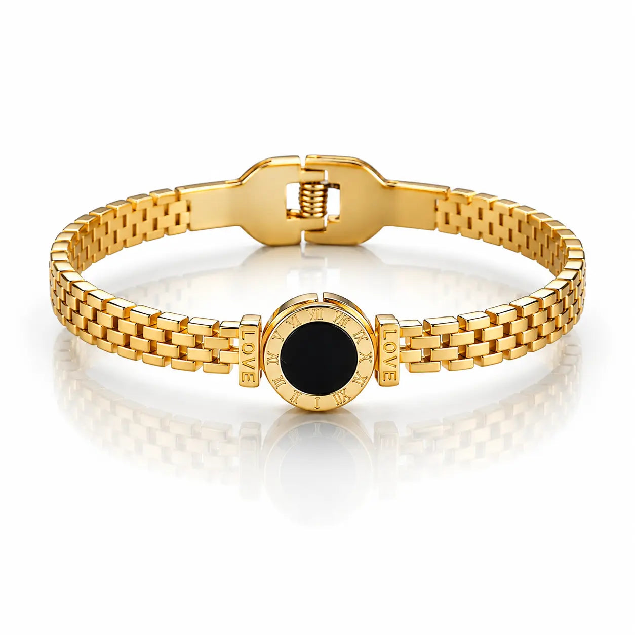 Gold bracelet with a black center on a white background