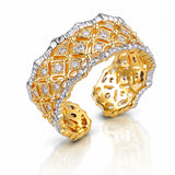 Gold and silver bracelet with diamond accents on a white background
