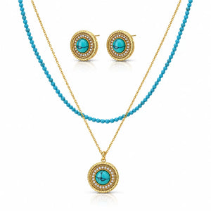 A gold and turquoise jewelry set featuring a double-strand beaded necklace with a round pendant, matching stud earrings, and a gold chain with a round pendant, all displayed on a clean white background.
