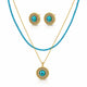 A gold and turquoise jewelry set featuring a double-strand beaded necklace with a round pendant, matching stud earrings, and a gold chain with a round pendant, all displayed on a clean white background.